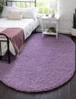 Unique Loom Solid Shag Collection Area Rug (8' x 10' Oval, Lilac)