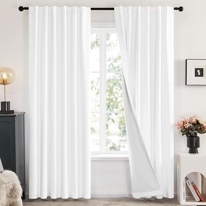 Deconovo Blackout Curtains for Bedroom & Nursery, Thermal Insulated Drapes, Back Tab & Rod Pocket, Noise Reducing, Energy Saving Room Darkening for Living Room 52W x 45L Inch 2 Panels, White