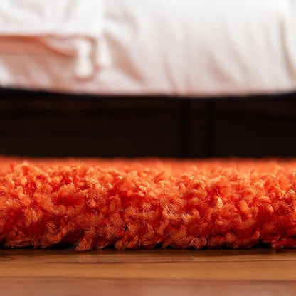 Unique Loom Solid Shag Collection Area Rug (5' 1" x 8' Oval, Tiger Orange)