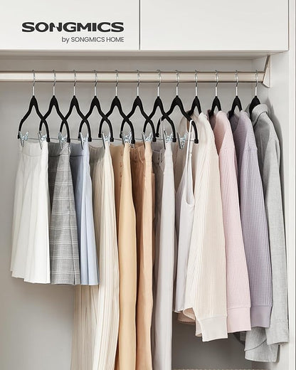 SONGMICS 30 Pack Pants Hangers, 16.7 Inches Long Velvet Trousers Hangers with Adjustable Clips, Heavy-Duty, Non-Slip, Space-Saving for Pants, Skirts, Coats, Dresses, Tank Tops, Black UCRF12B30