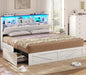 VIAGDO Farmhouse Bed Frame King Size with Bookcase Storage Headboard, Charging Station and LED Lights, Wooden King Bed Frame with 4 Drawers, Barn Door Design, No Box Spring Needed, No Noise, White