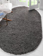 Unique Loom Solid Shag Collection Area Rug (5' 3" x 8' Oval, Graphite Gray)
